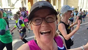 lady running in a marathon