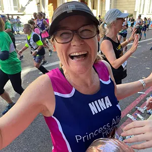 lady running in a marathon
