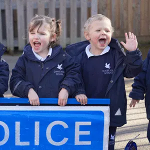 students holding a police sign