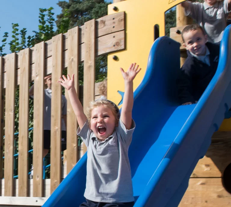 girl going down a slide