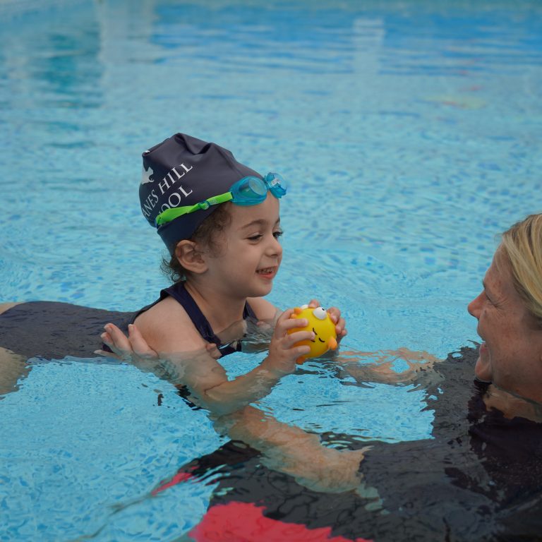 student swimming