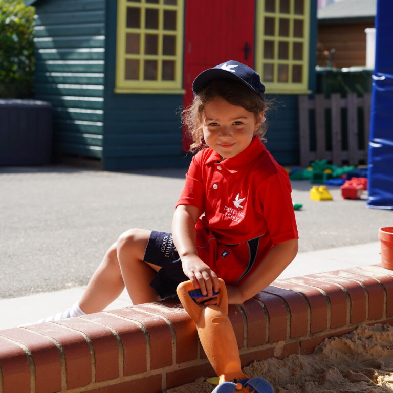 girl by the sandpit