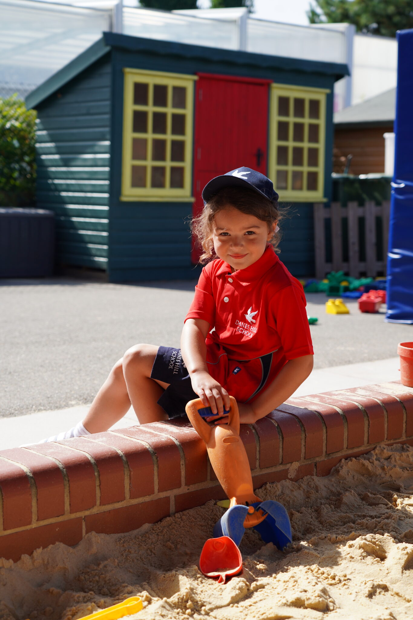 girl by the sandpit